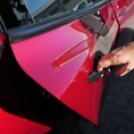 Abra la puerta Tesla con una manija de puerta iServices